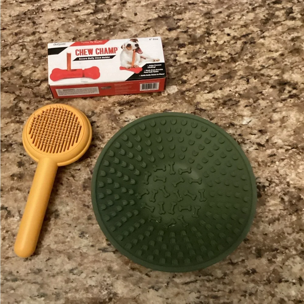 Dog brush, dog bowl and chew champ